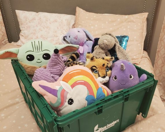 Bin packed with stuffed animals